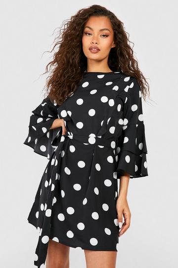 Robe patineuse volantée à imprimé pois noir