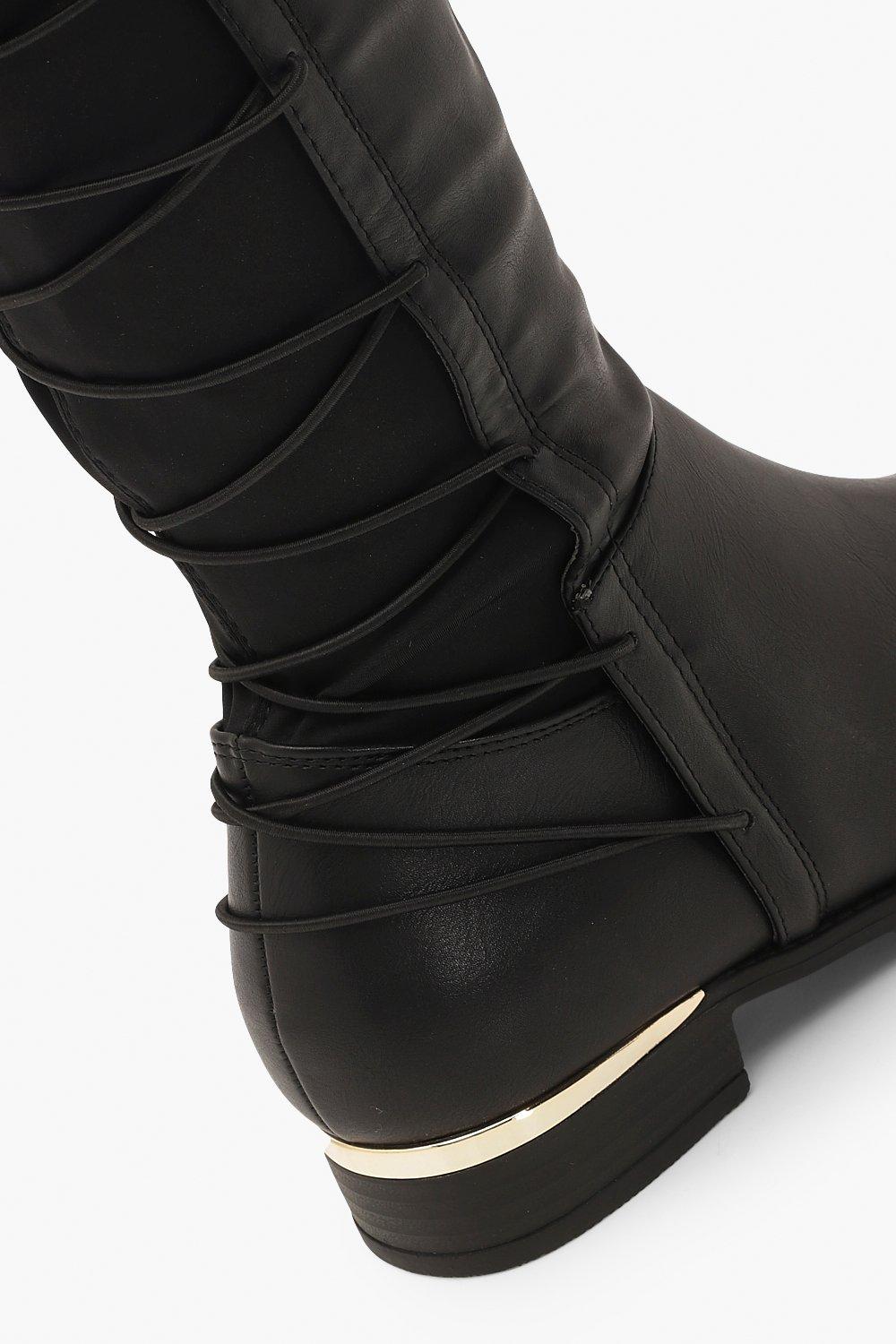 bottes lacets derriere