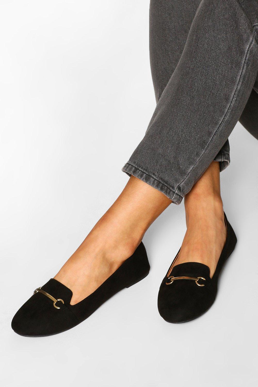 RAID flat shoes with gold buckle in black