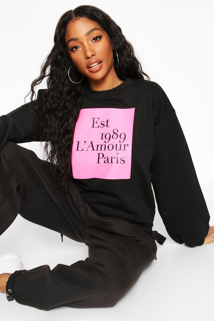 Sweatshirt med blockfärger och fransk slogan image number 1
