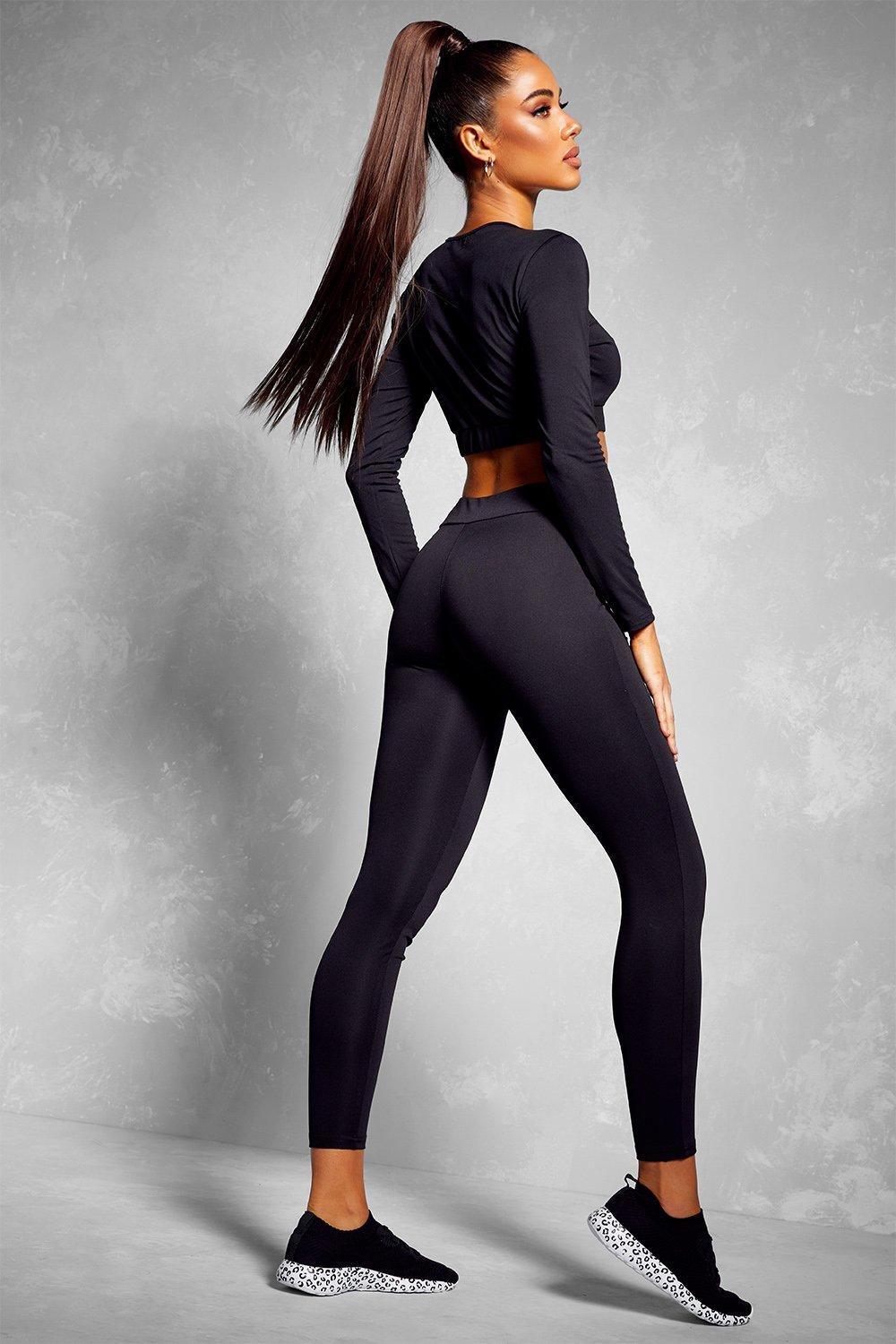 https://media.boohoo.com/i/boohoo/fzz74708_black_xl_1/donna-nero-fit-set-palestra-top-e-legging-con-maniche-lunghe-woman