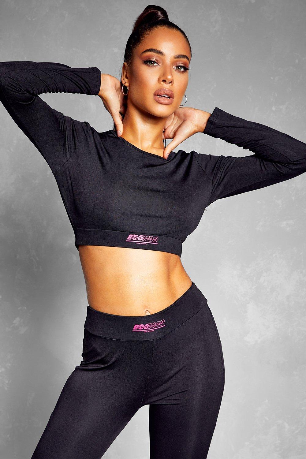 https://media.boohoo.com/i/boohoo/fzz74708_black_xl_3/female-black-fit-woman-long-sleeve-top-&-legging-gym-set