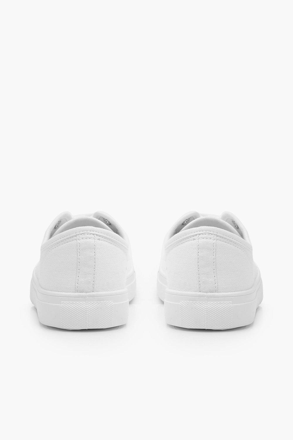 white canvas lace up sneakers