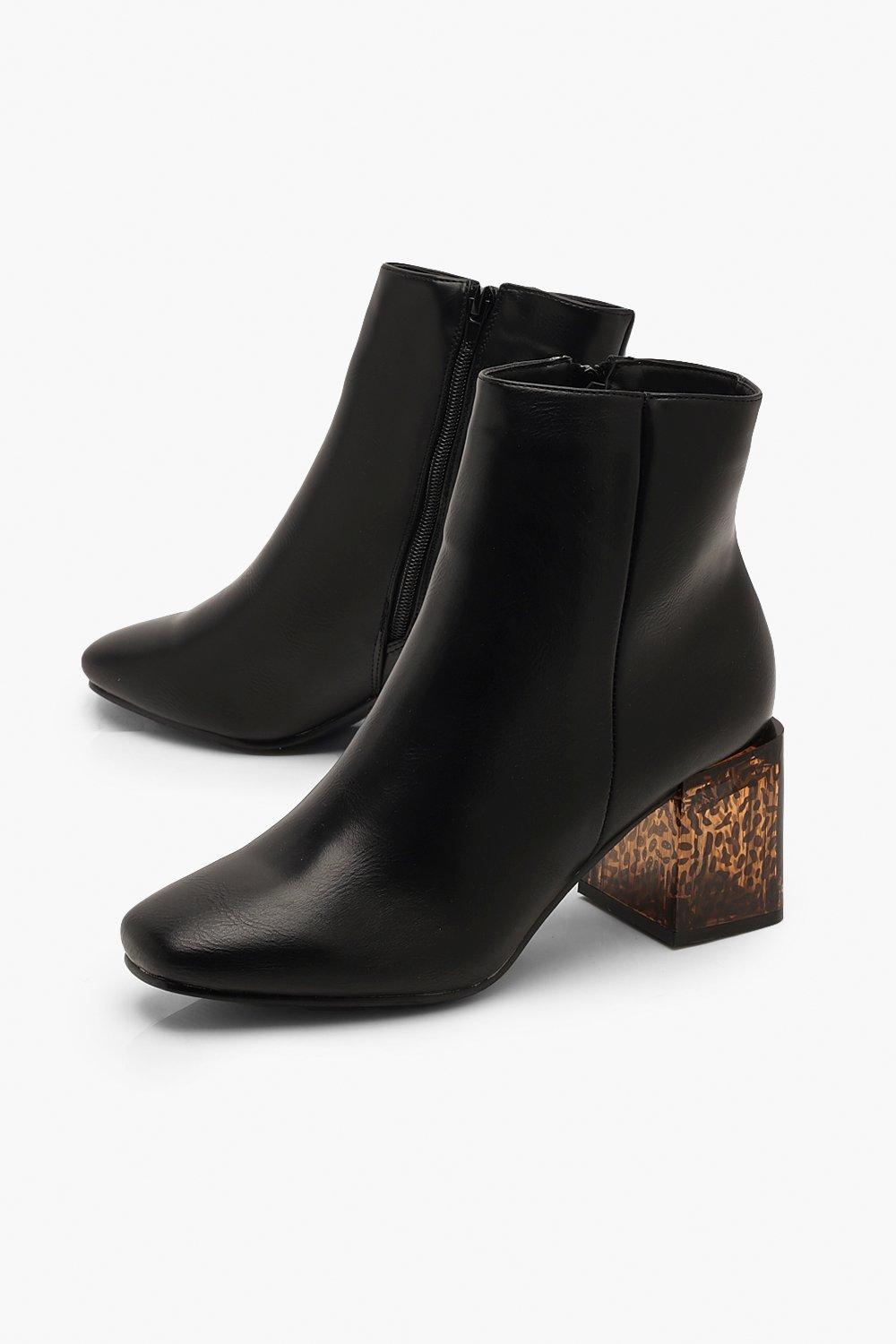 Black boots with tortoise heel hotsell