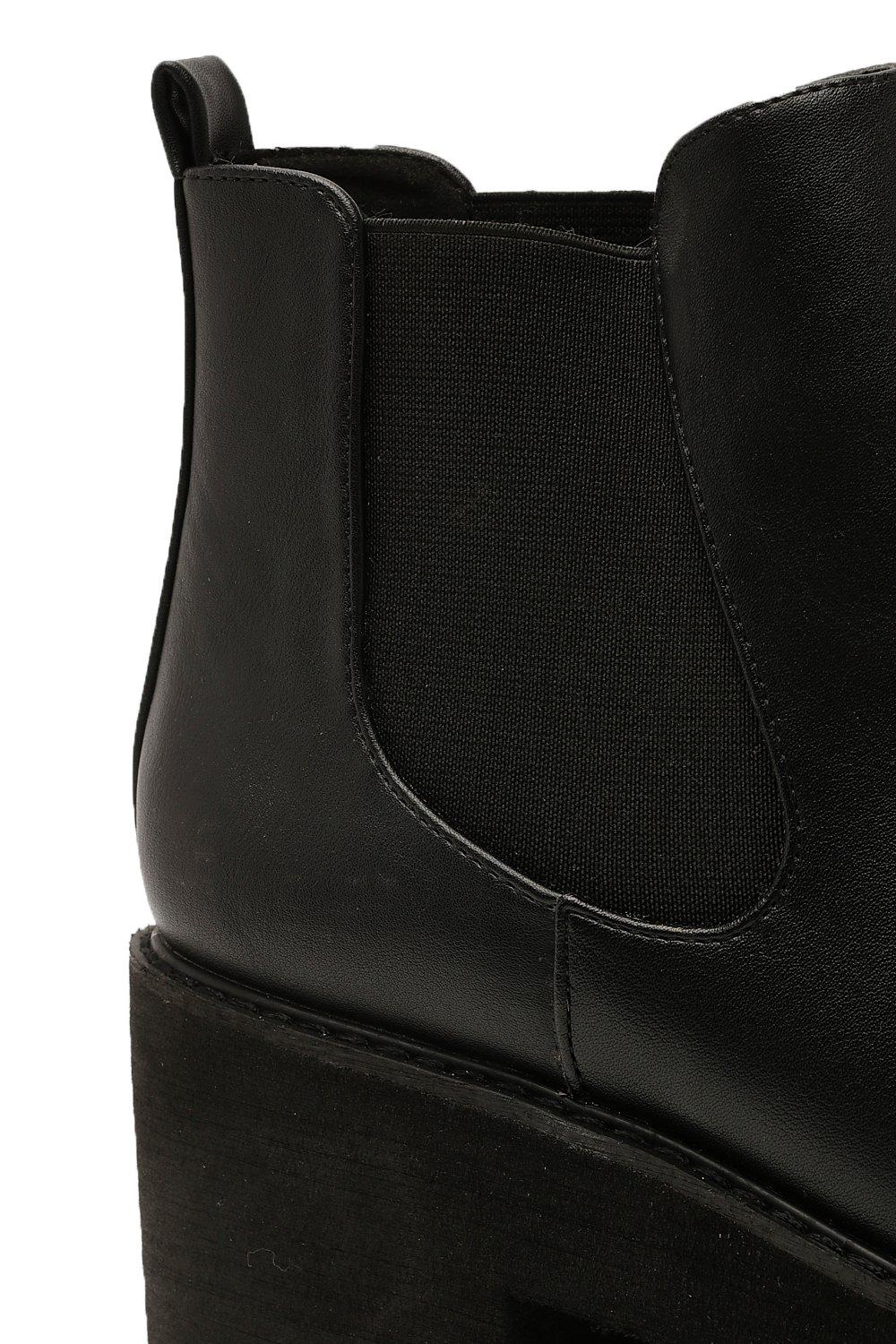 black cleated chelsea boots