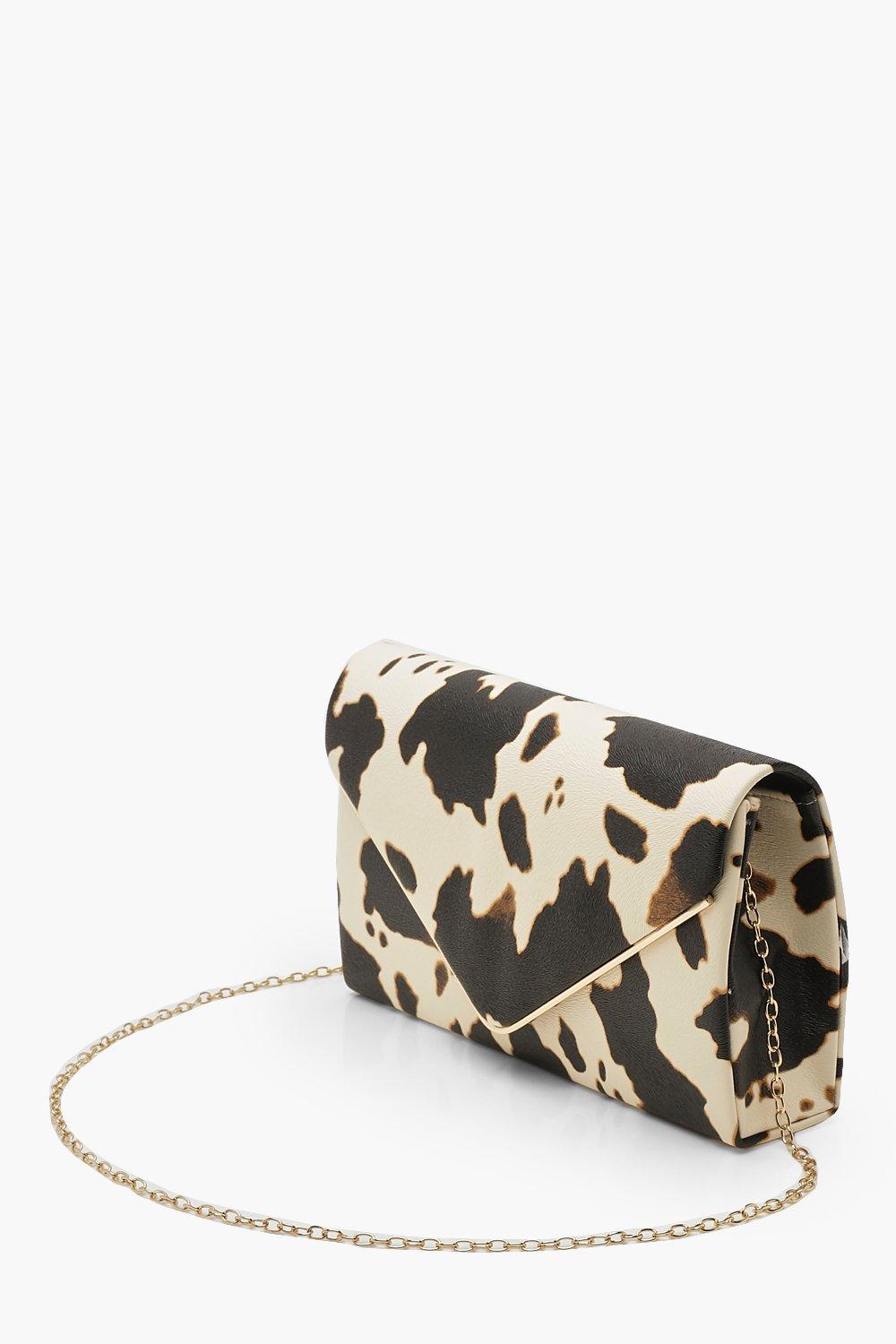 Cow print clutch bag sale