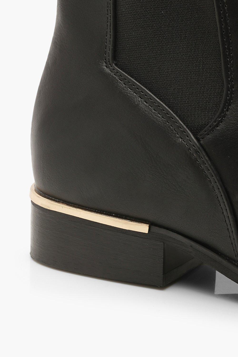 black metal trim chelsea boots