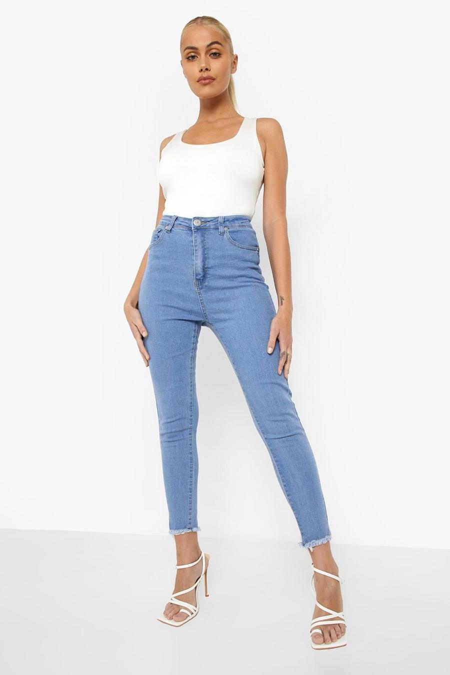 Jeans Skinny Fit con fondo sfilacciato, Azzurro chiaro image number 1