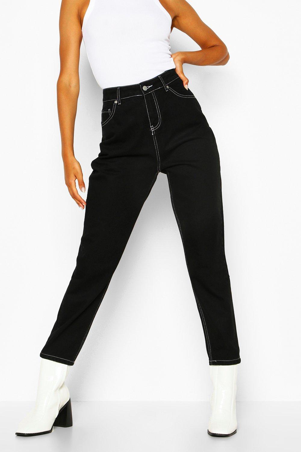 white mom jeans with black stitching