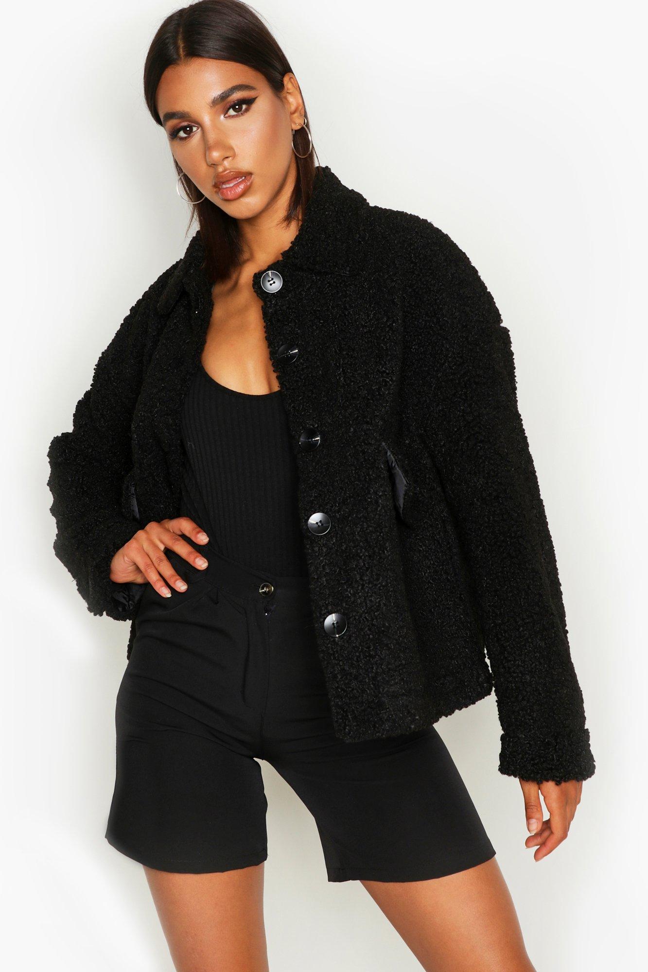 Chaqueta estilo camionero en piel sintética de peluche | boohoo