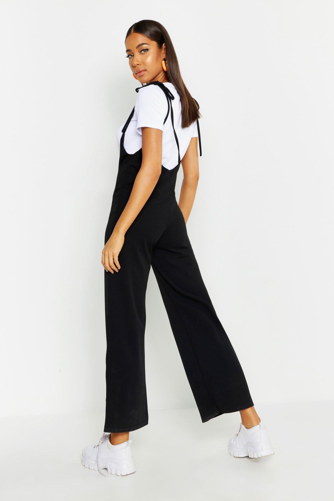 Black jumpsuit with store shirt underneath