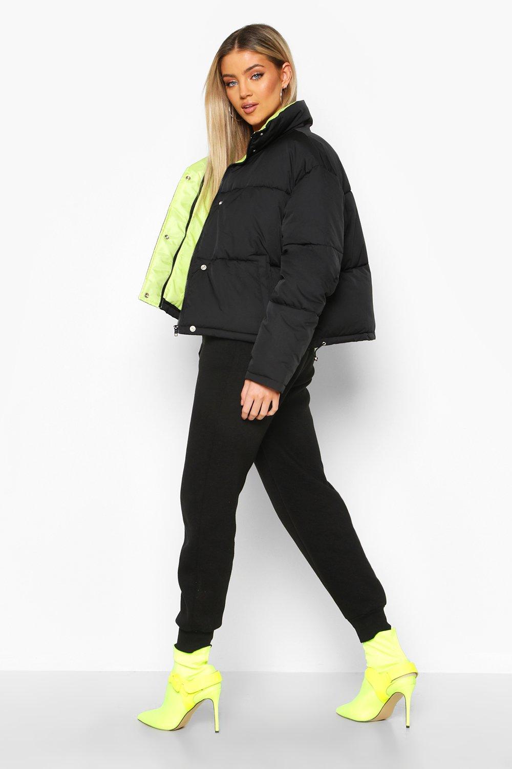 black puffer jacket with yellow lining