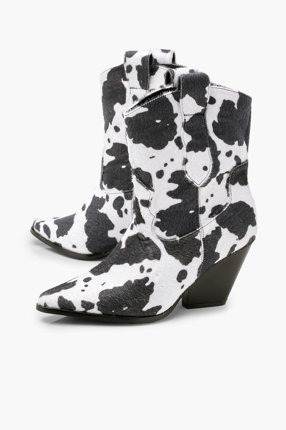 black and white cow print boots