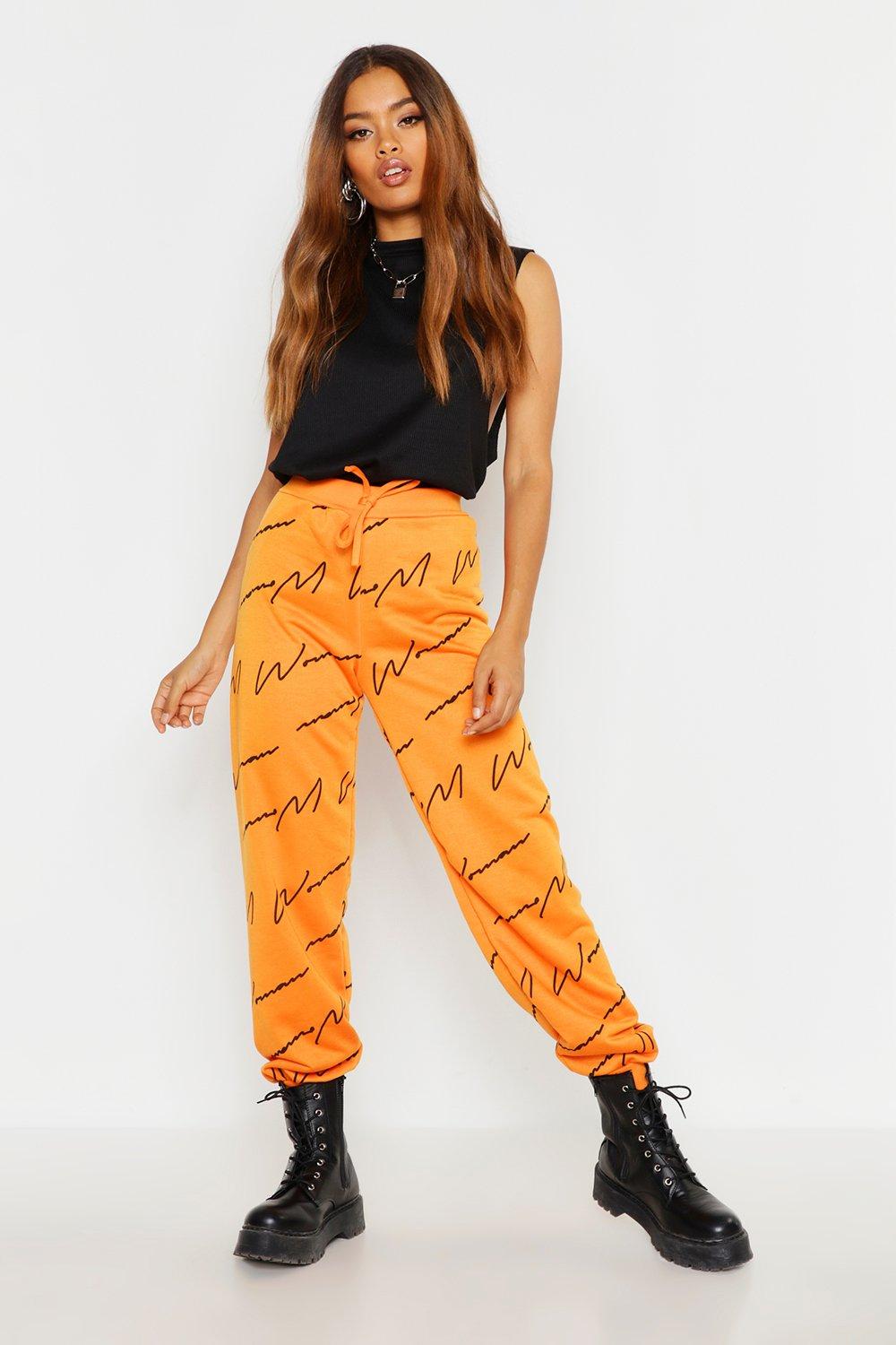 Woman script all over print joggers new arrivals