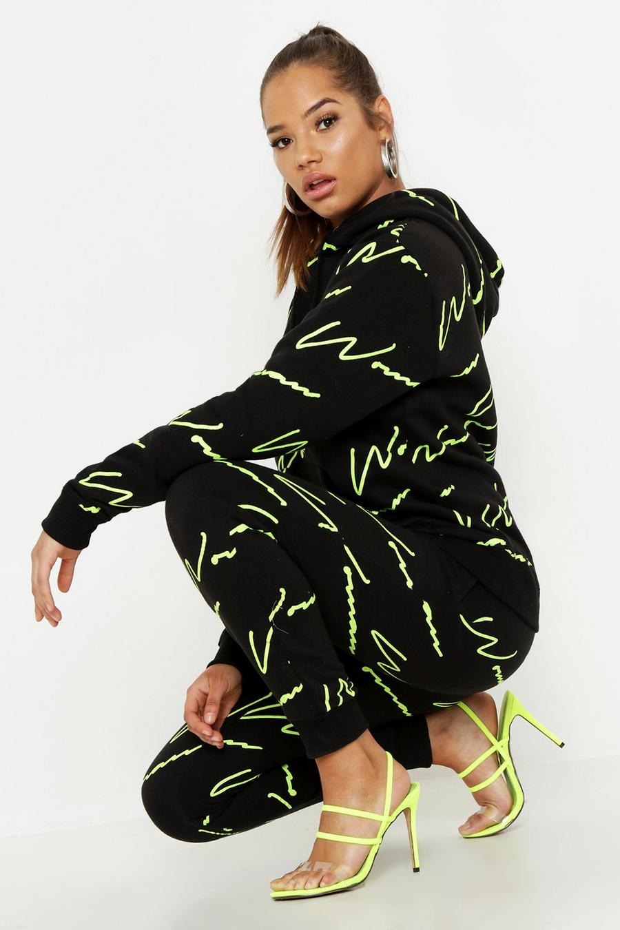 Fit Neonfarbener Trainingsanzug durchgehendem „Woman“-Print image number 1