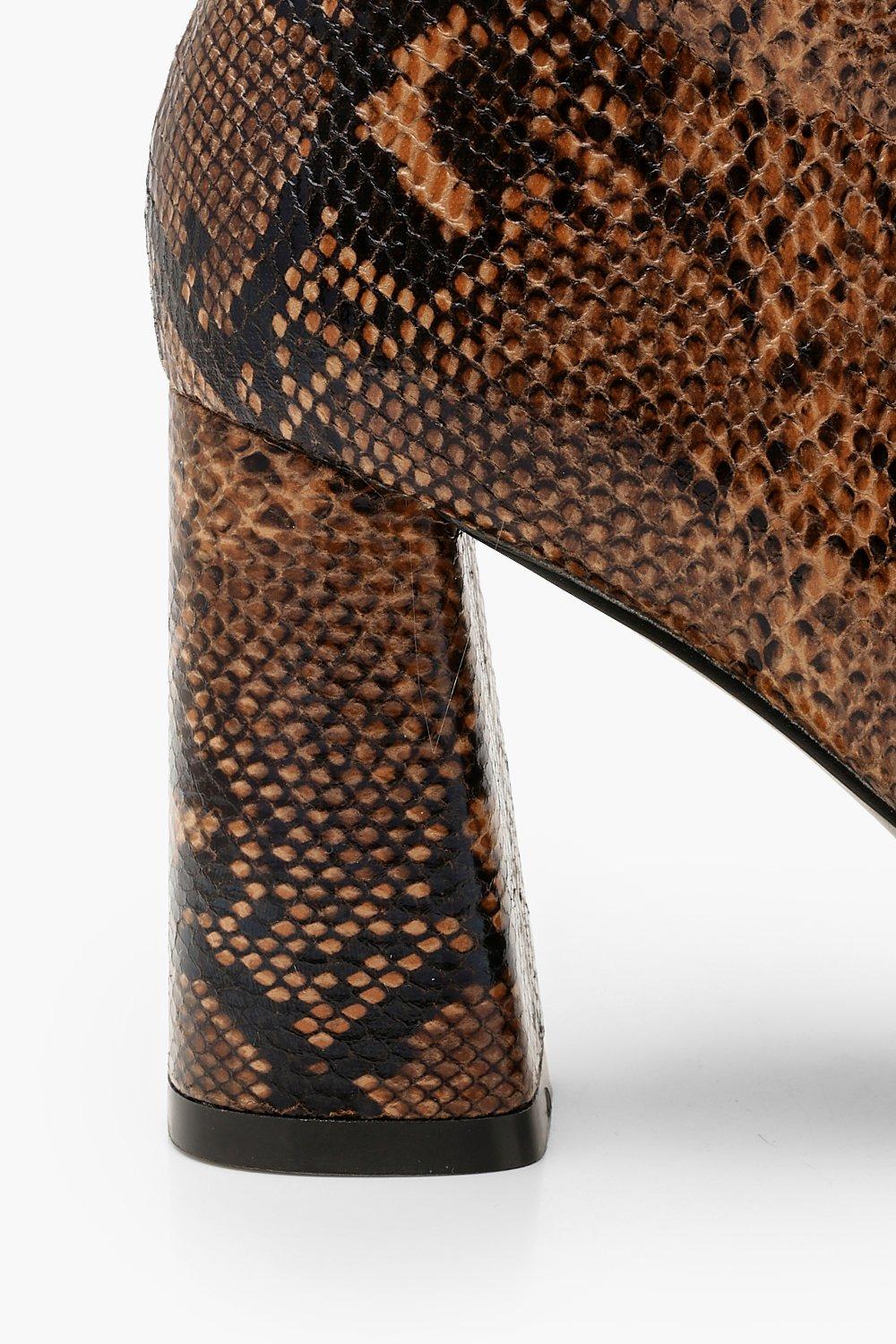 snake high knee boots