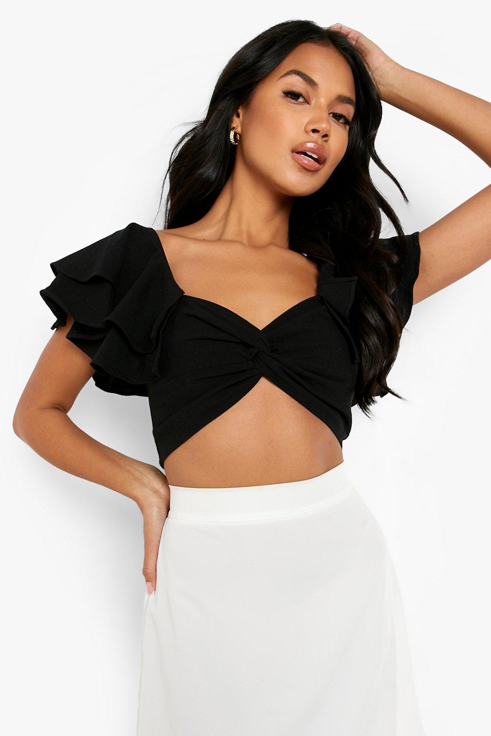 Black top with store ruffle sleeves