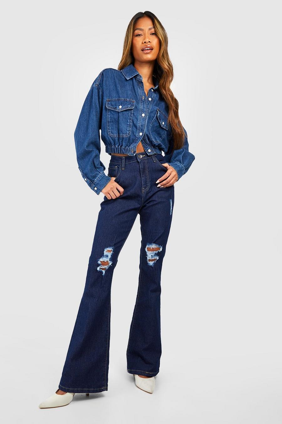 Indigo Basic Högmidjade utsvängda jeans med slitage image number 1
