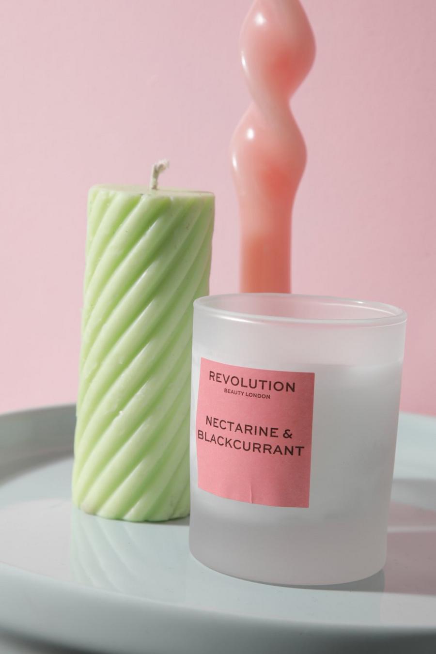 Salmon pink Revolution Nectarine & Blackcurrant Candle
