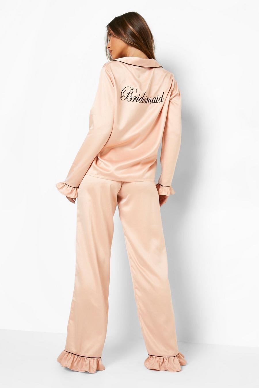 Set pantaloni Premium in fibre riciclate con scritta Bridesmaid ricamata e volant, Rose gold metálicos
