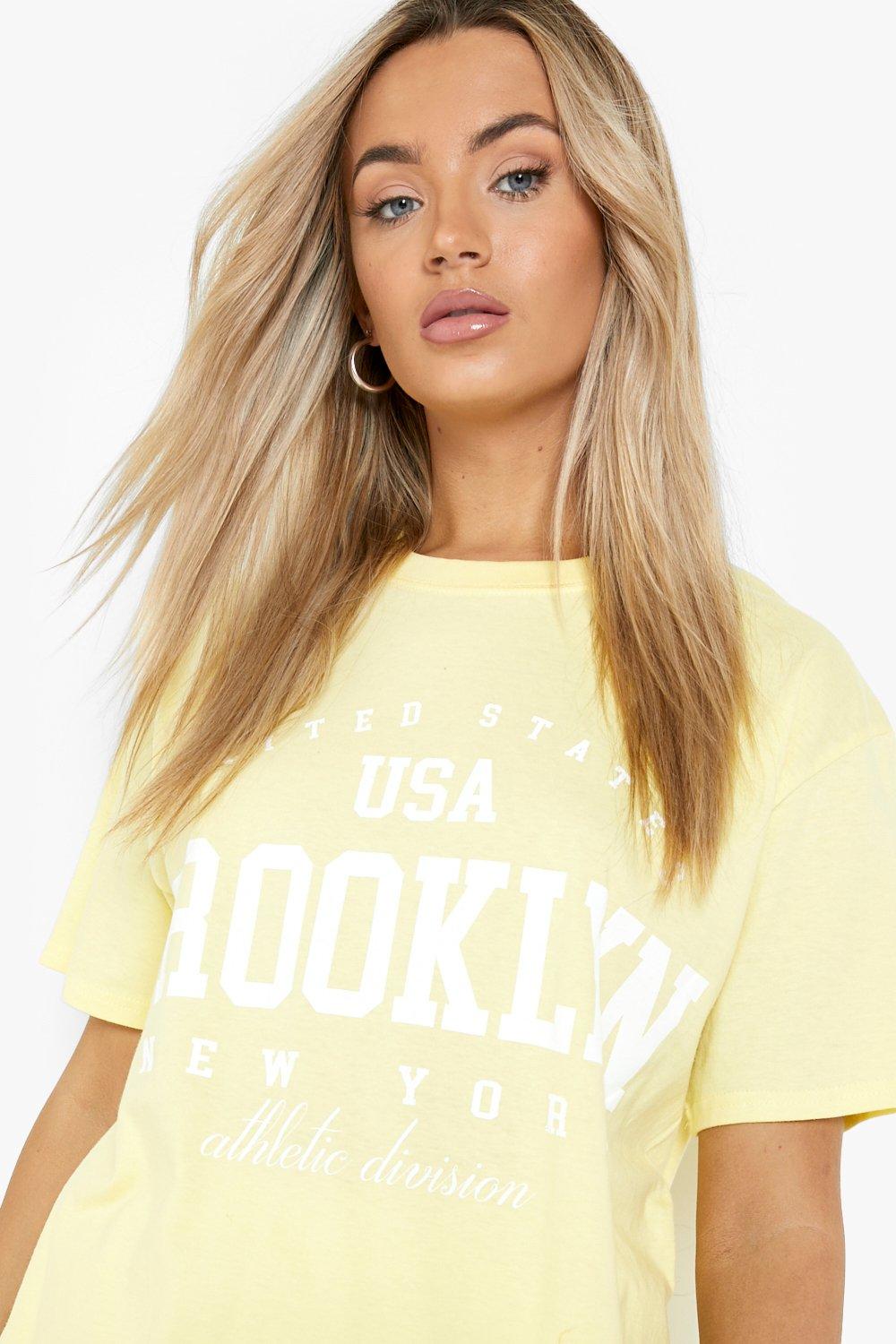 love this outfit! White Brooklyn Slogan Oversized T Shirt perfect for them  off-duty days. Team it with some faux leath…