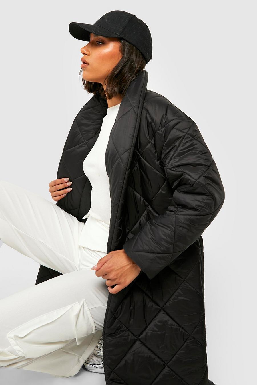 Black Quiltad puffer jacket med bälte image number 1