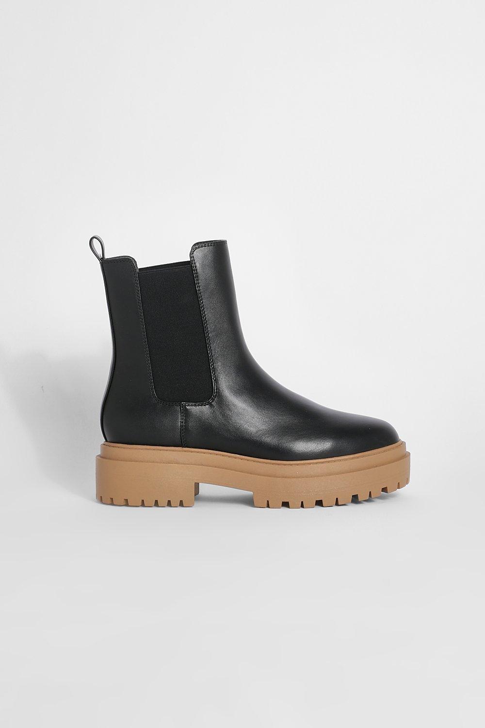 Black chelsea boots outlet brown sole