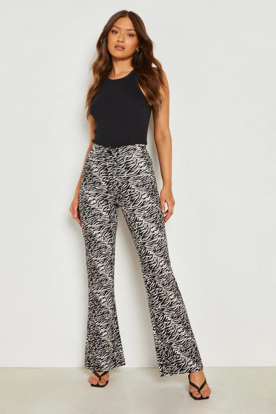 Black Zebra Printed Woven Flared Trousers image number 1