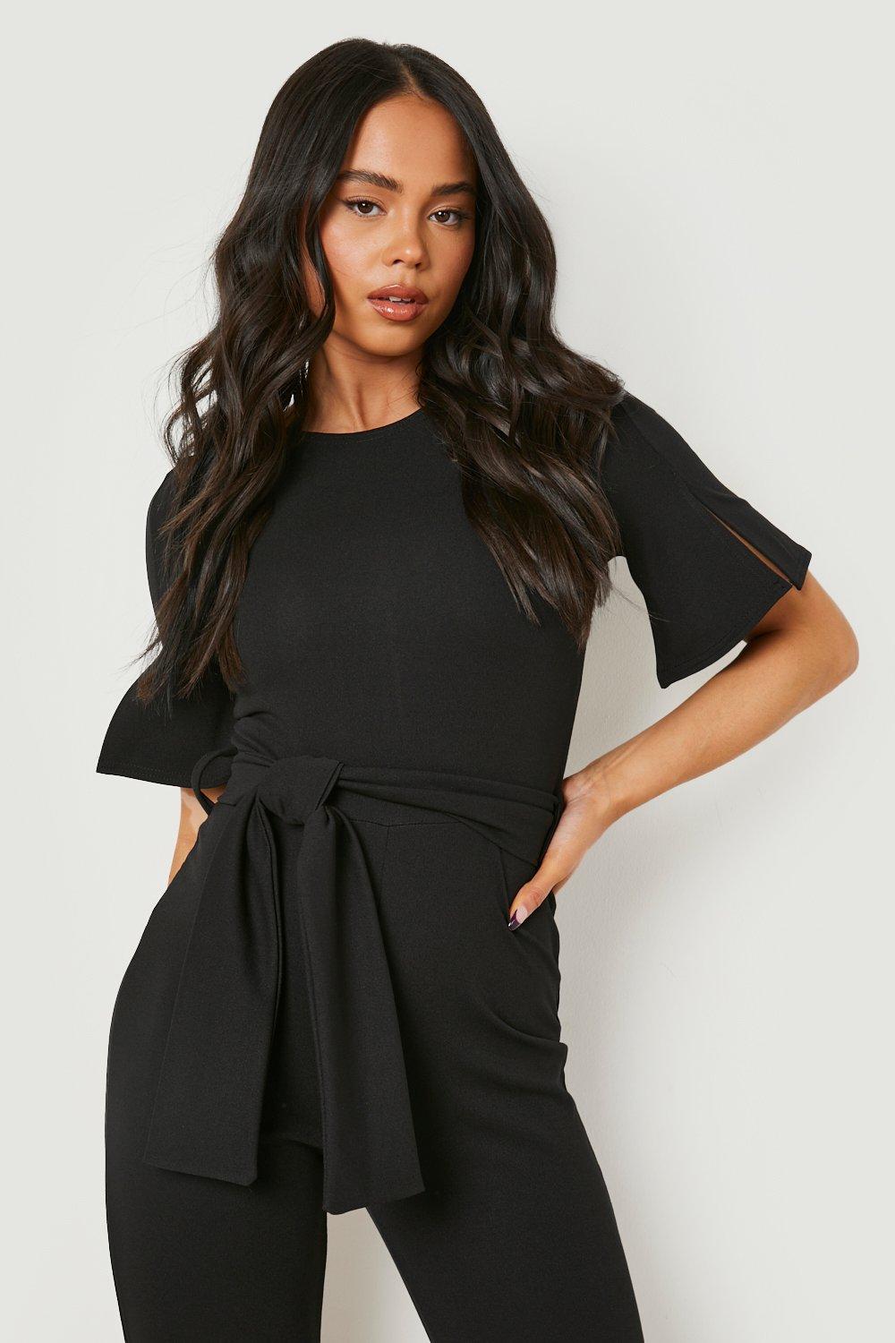 https://media.boohoo.com/i/boohoo/gzz14188_black_xl_3/female-black-petite-cape-sleeve-belted-tailored-jumpsuit