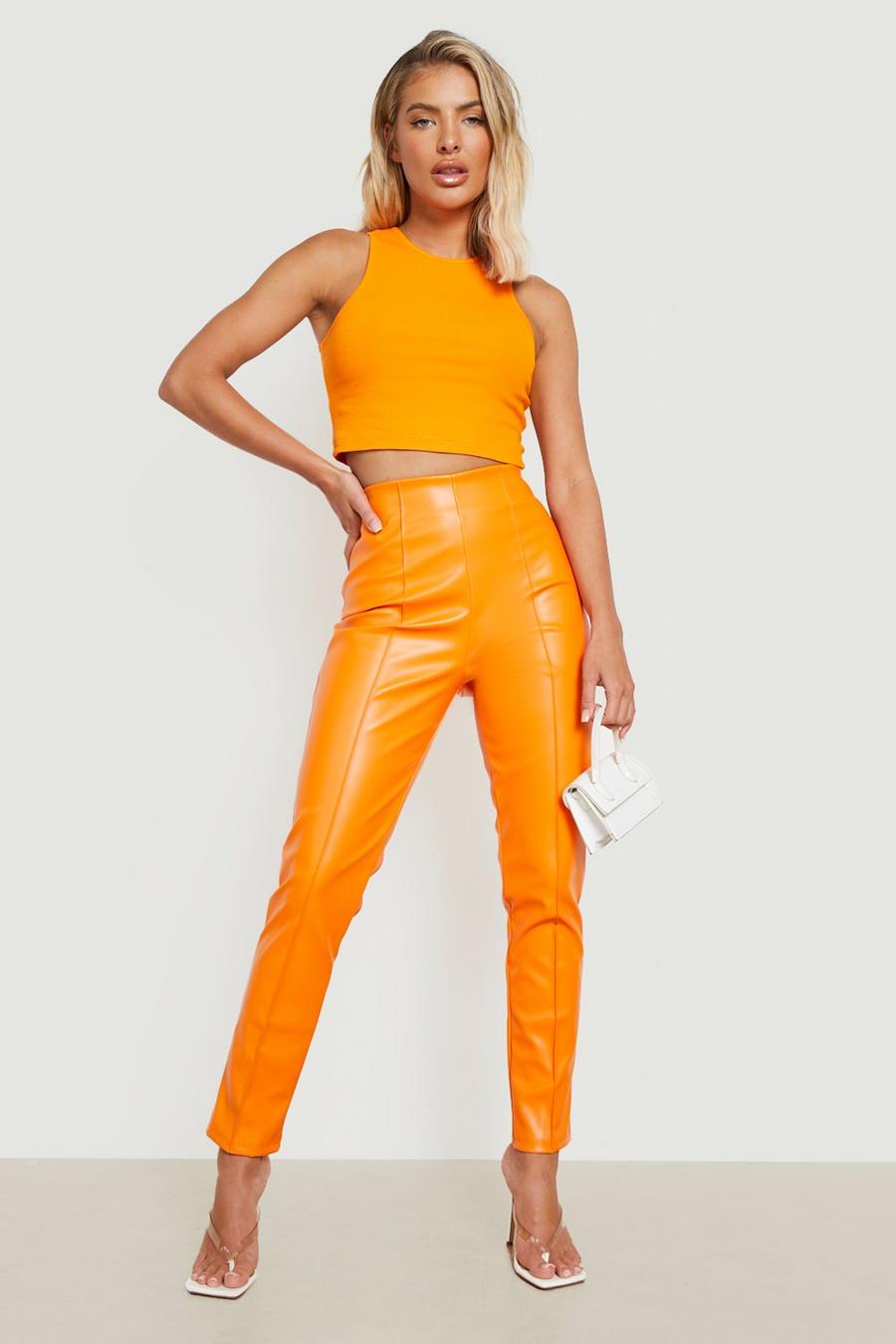 Pantalón pitillo de cuero sintético con costuras frontales, Orange naranja image number 1