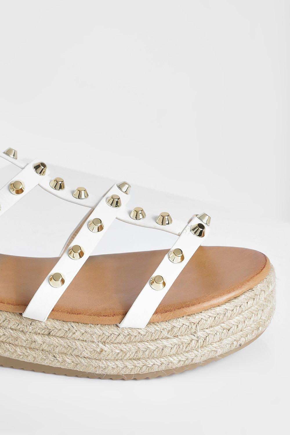 White store studded flatforms