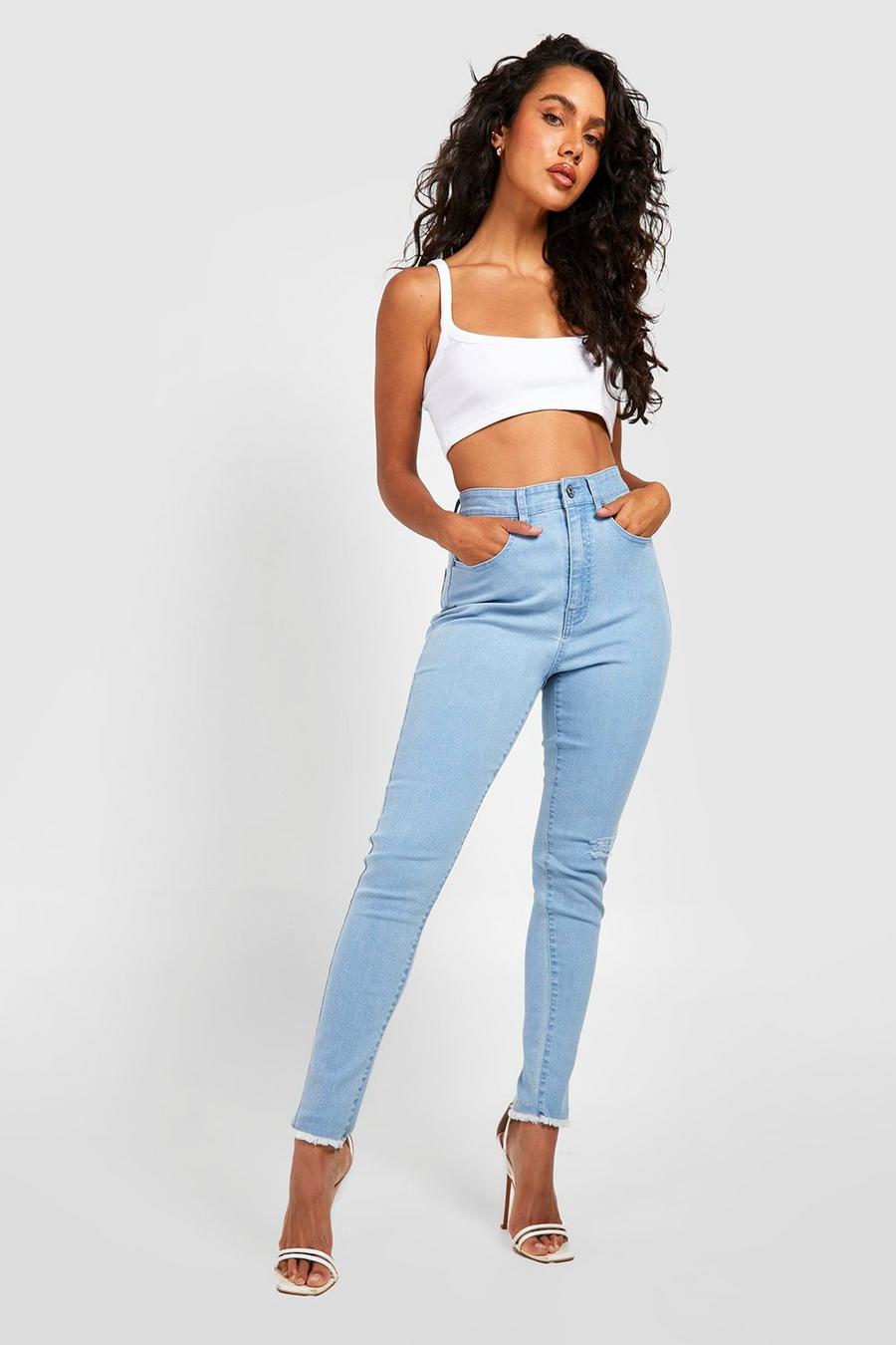 Light wash blue High Waisted Raw Hem Ripped Skinny Jeans image number 1