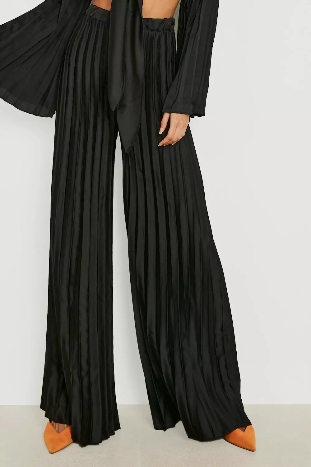 Black pleated wide leg trousers