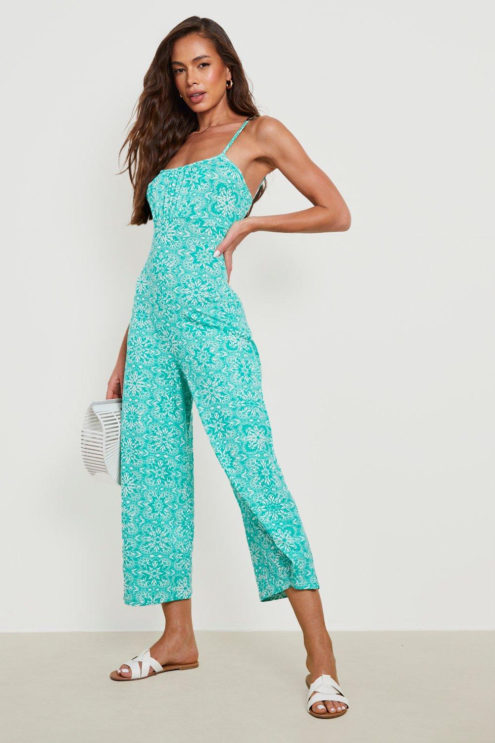 ASOS DESIGN bubble crepe button back long sleeve jumpsuit in floral print