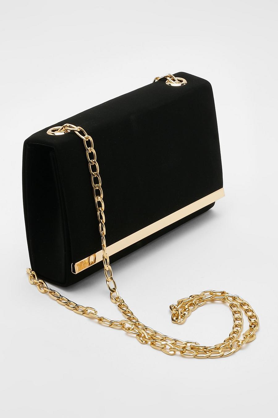 Truffle shoulder bag with gold hardware and chain strap in black