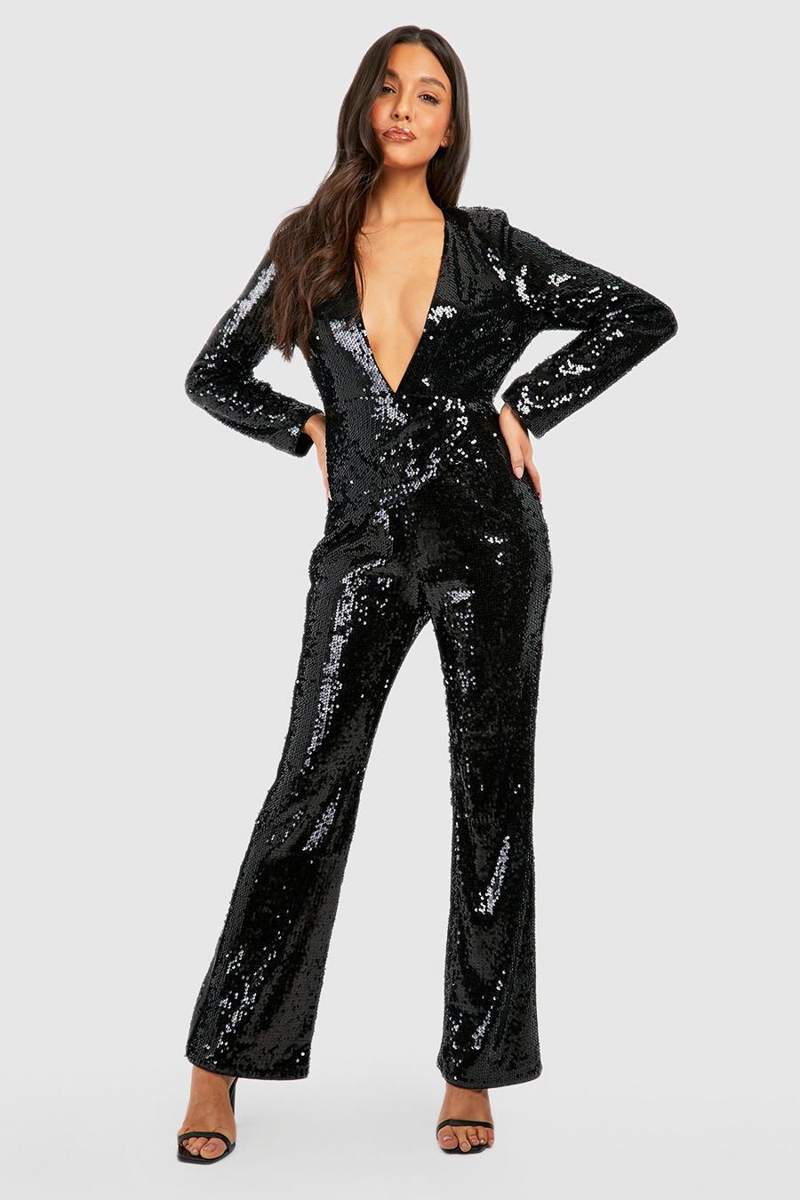 Black Glittrig jumpsuit med paljetter, axelvaddar och låg urringning image number 1