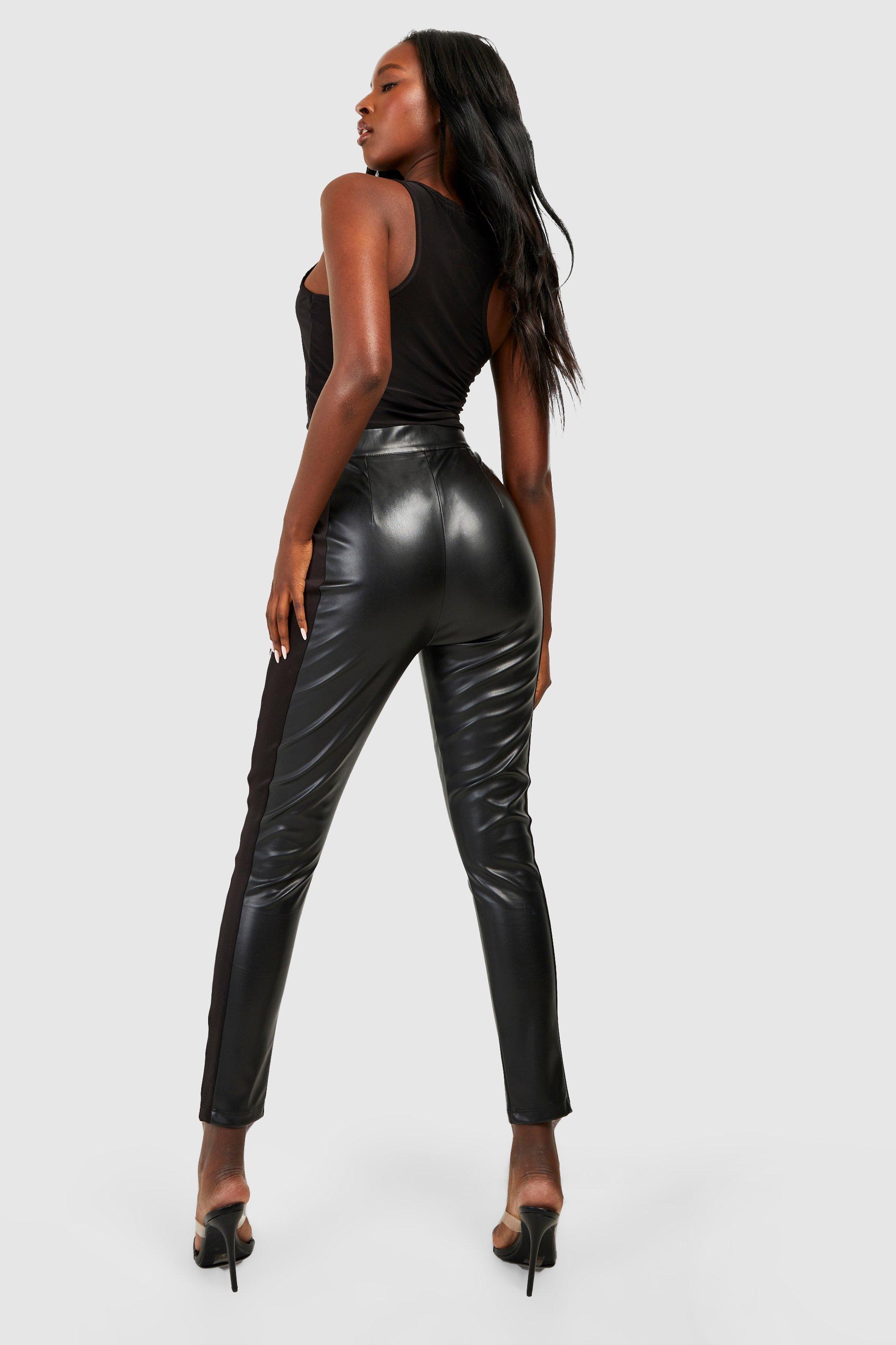 https://media.boohoo.com/i/boohoo/gzz27561_black_xl_1/female-black-zip-hem-pu-leggings
