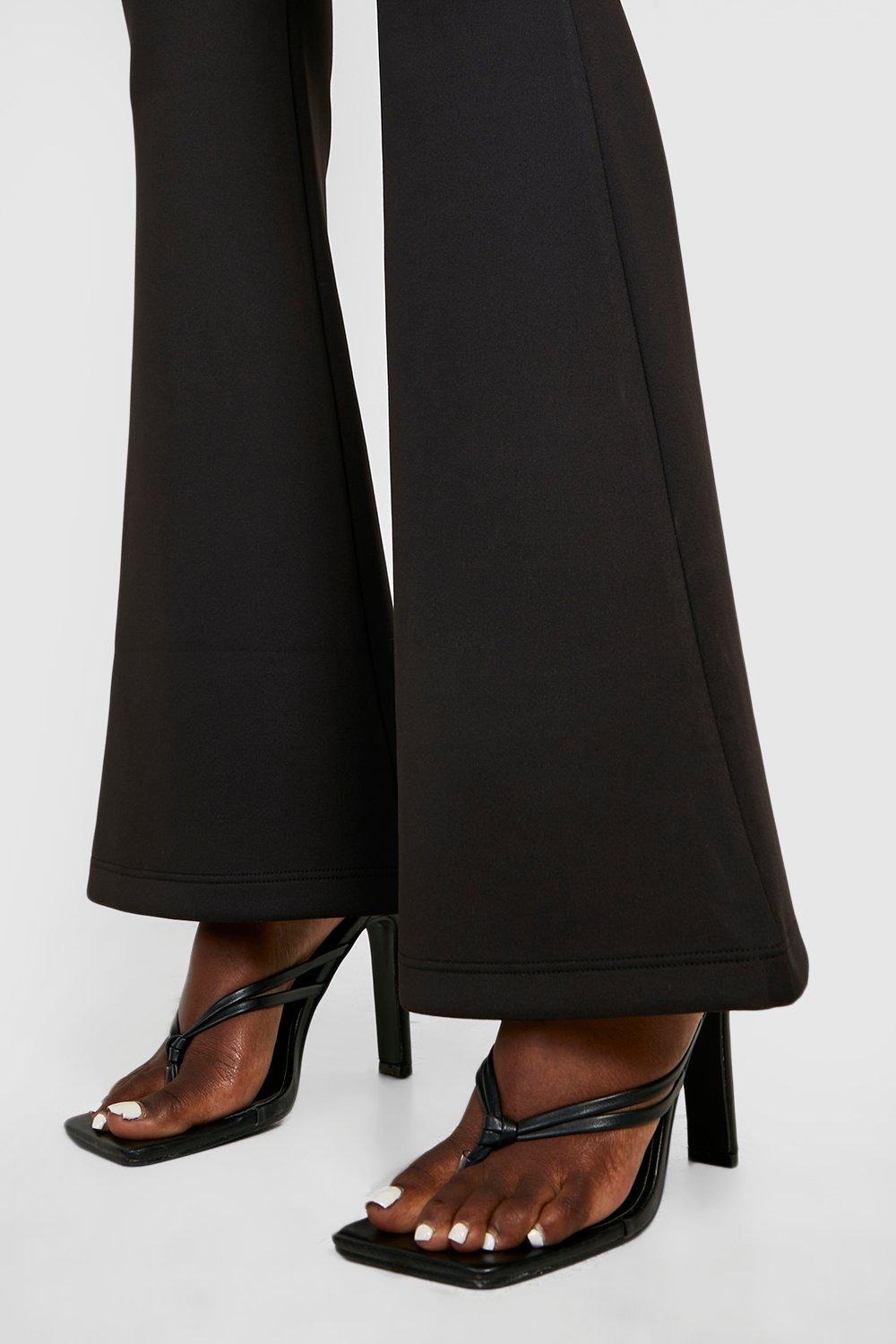 https://media.boohoo.com/i/boohoo/gzz28007_black_xl_3/female-black-shaping-high-waisted-scuba-flare-pants