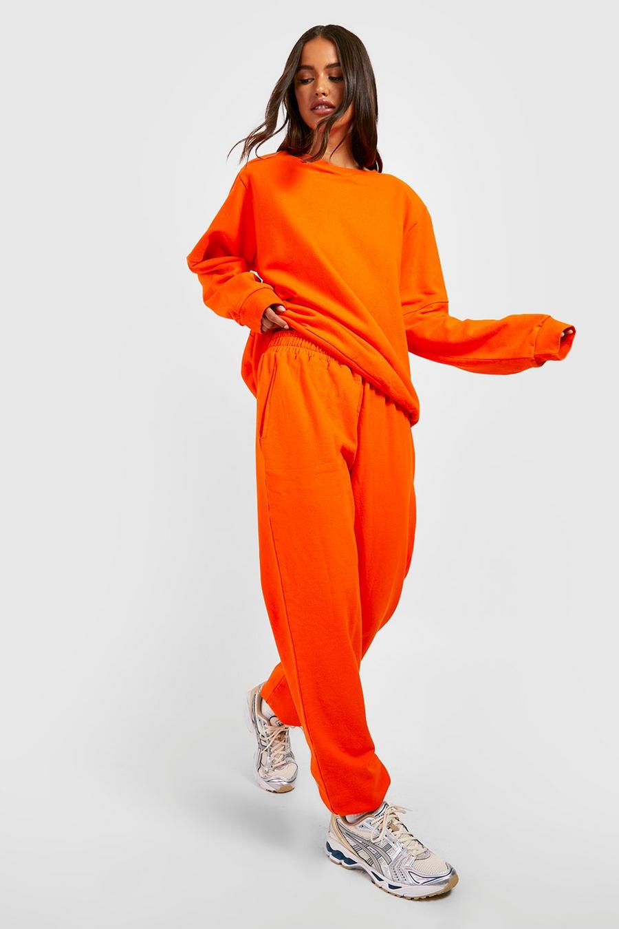 Orange Oversized sweatshirt med axelvaddar och mjukisbyxor image number 1