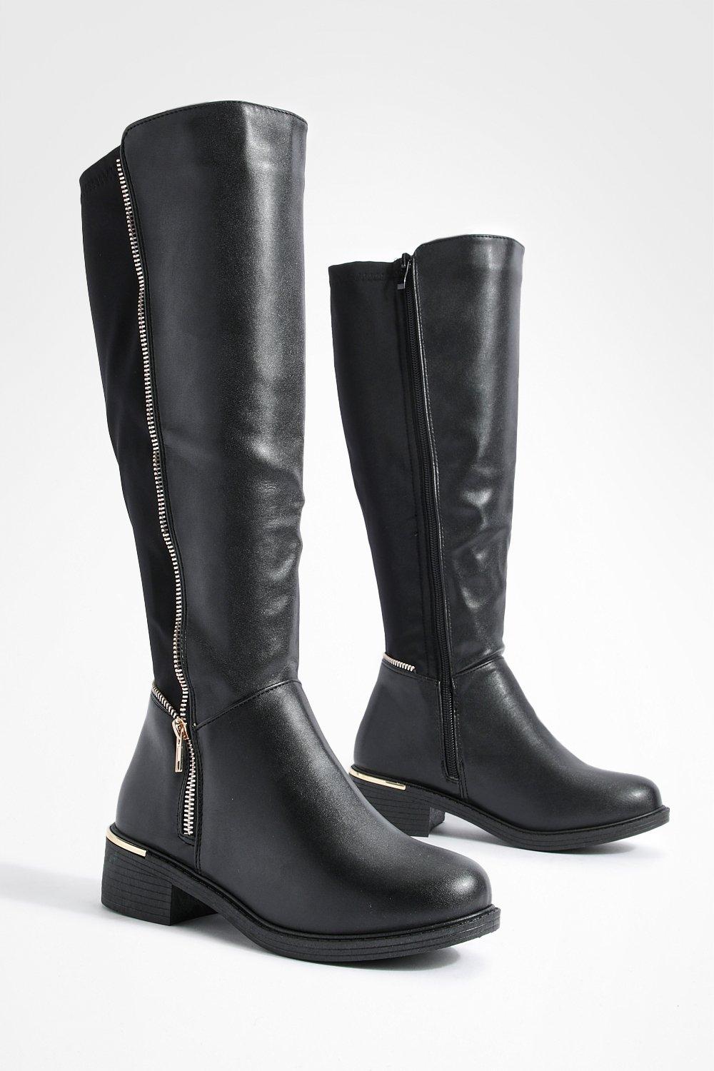 Black boots best sale with gold zipper