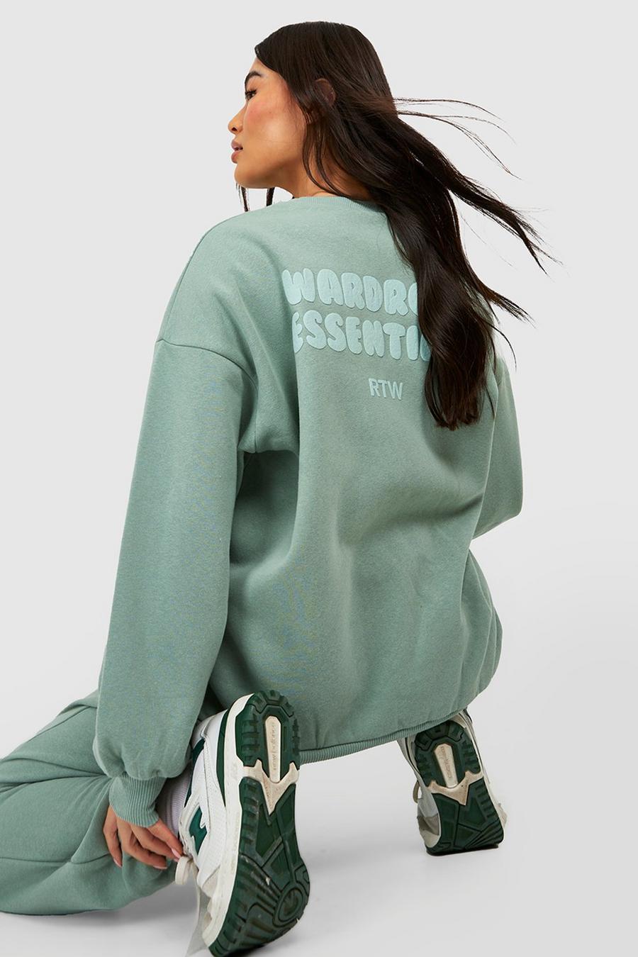 Sweatshirt mit Wardrobe Essentials Slogan, Sage grün