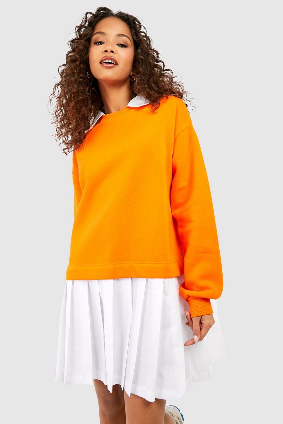 Orange 2-i-1 Sweatshirtklänning med veckad kjol image number 1