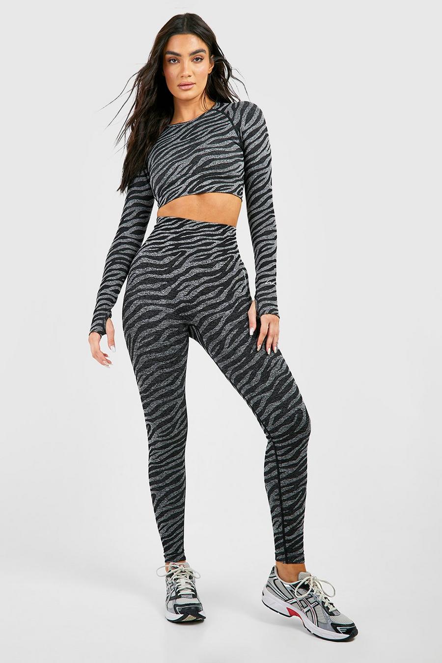 https://media.boohoo.com/i/boohoo/gzz34920_black_xl/female-black-zebra-contouring-seamless-gym-sculpt-leggings/?w=900&qlt=default&fmt.jp2.qlt=70&fmt=auto&sm=fit