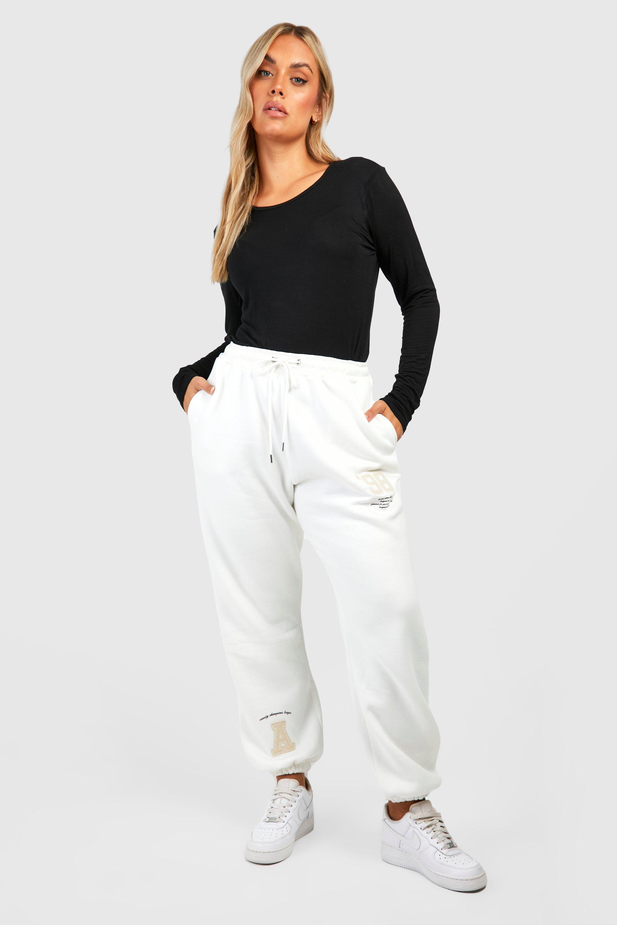 White t store shirt black joggers