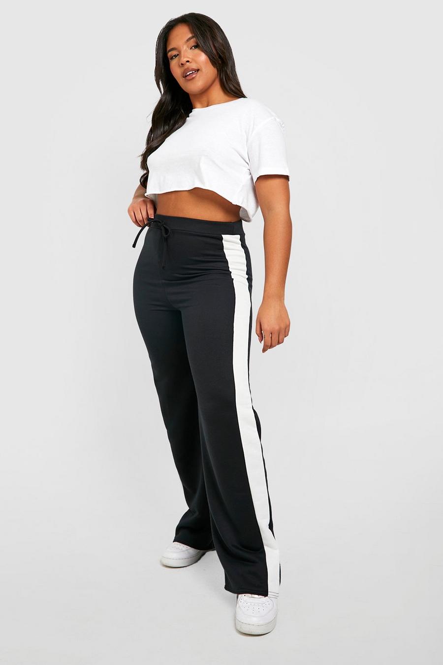 Pantalón deportivo Plus de pernera ancha y tela rizo con línea, Black image number 1