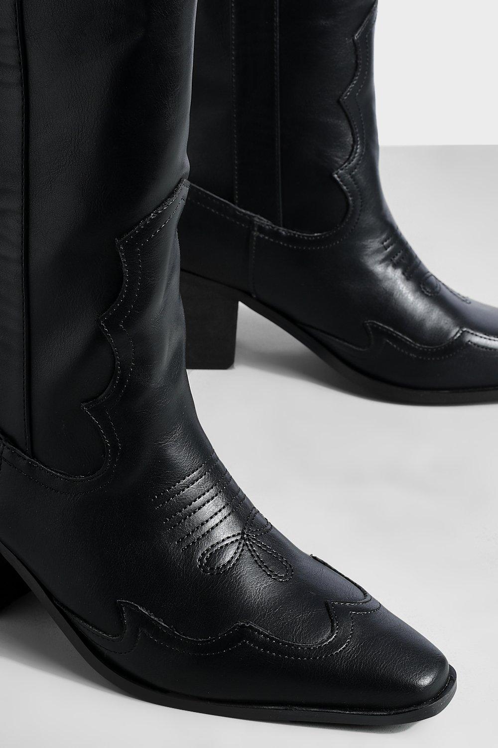 Black heeled western boots hotsell