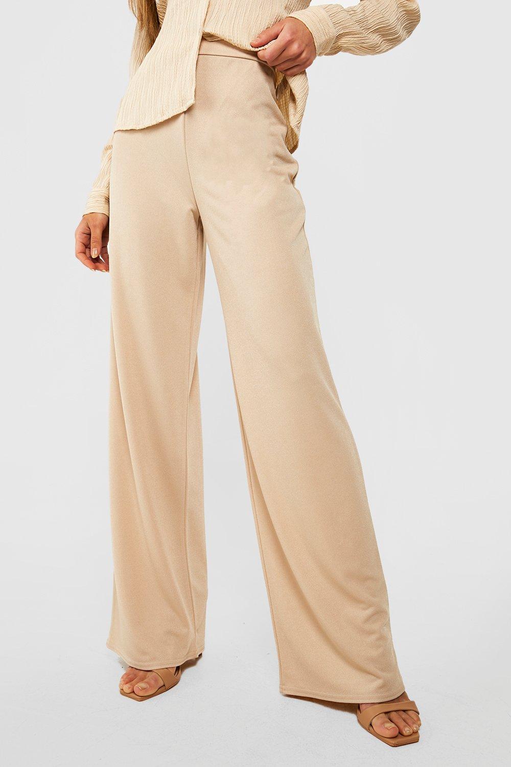 https://media.boohoo.com/i/boohoo/gzz39935_stone_xl_3/mujer-stone-pantalones-de-tela-crepe-con-pernera-ancha