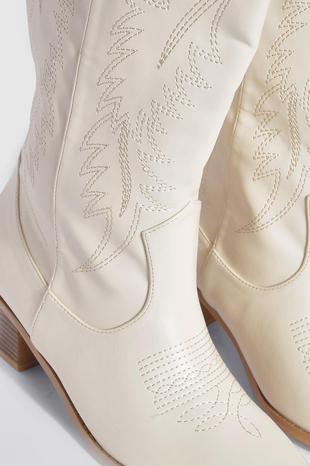 White embroidered cowboy store boots