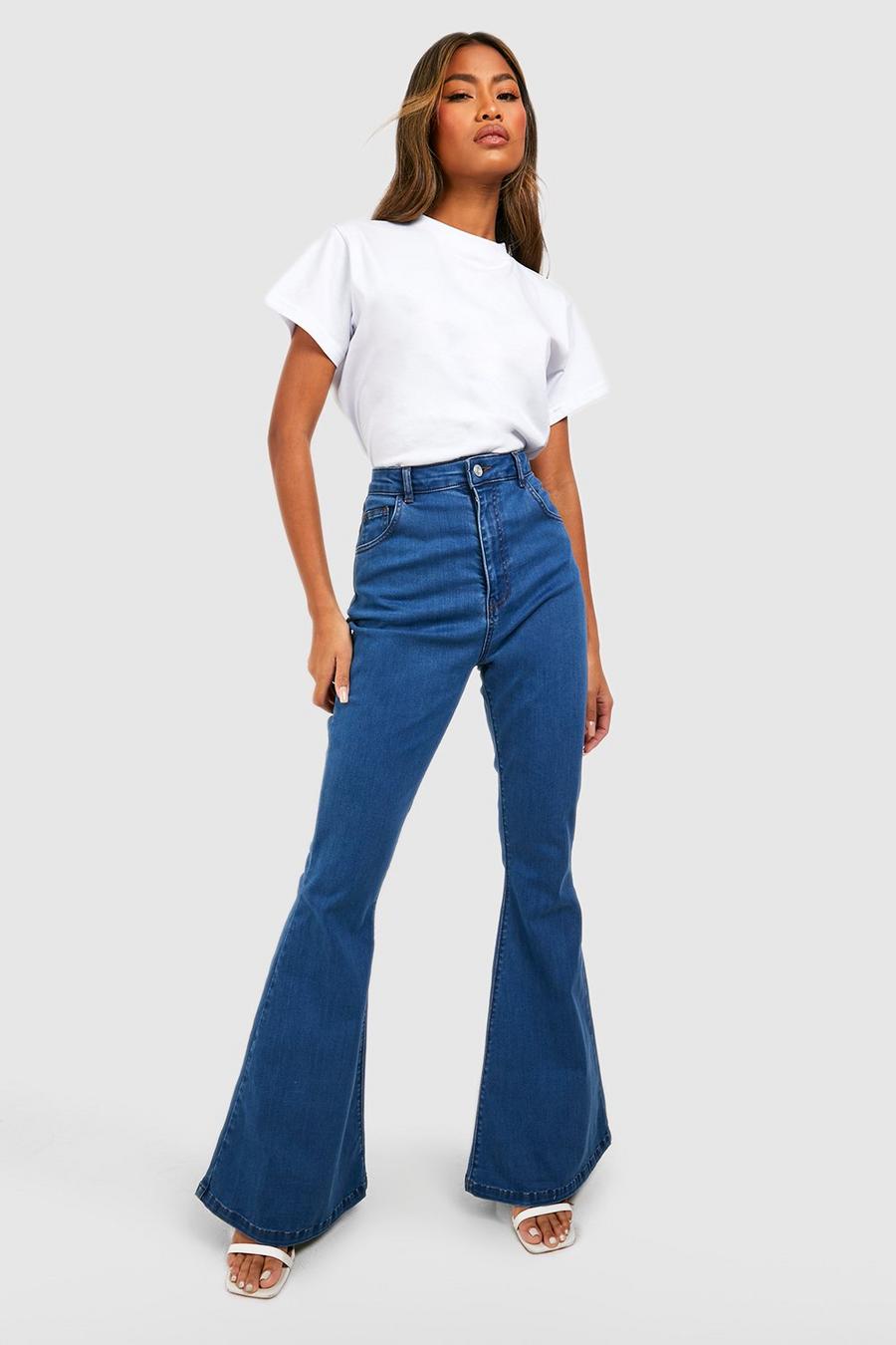 New Look 70s high waist flared jeans in mid blue