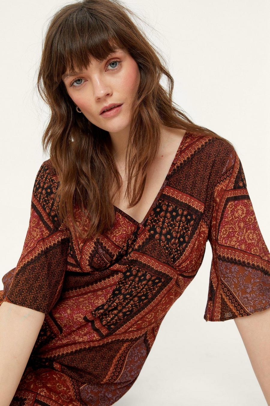 Brown Cheesecloth Paisley Print Plunging Jumpsuit